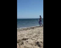 Man selfie stabilizer body towel run beach