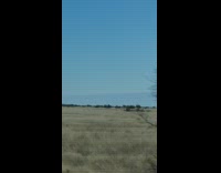 Long straight edge of clouds blue sky