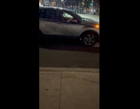 Gray car driver drummer with drum sticks night