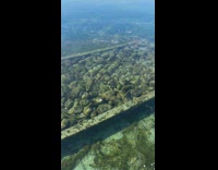 Walking on frozen lake water