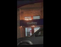 small fire on green riseboro sign 