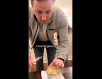 Man makes cereal for wife