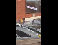 Girl open buttoned shirt tiktok on rooftop