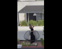 Woman black skirt stand on table terrace