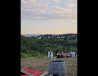 Collab IITW - Woman green top with glass at vineyard