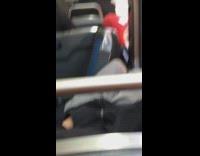 boy spiderman beanie hat face on window of train