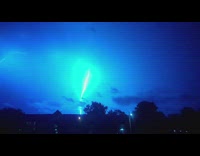 Bright lightning strike crawls on the clouds