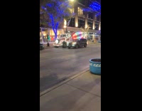 Cement truck with Christmas lights on street