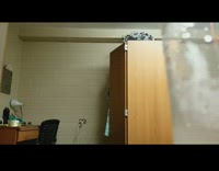 Girl hides then jumps out of closet and scares roommate in dorm room blue robe