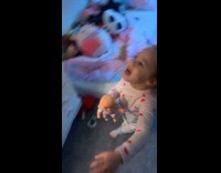 Woman teasing kids with elf on the shelf 