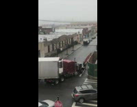 Truck driver fails at turning on street