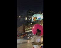 guy hits huge pink ball into street 
