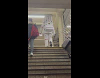 Collab Subway Creatures - Person in Spacesuit Costume Walks Upstairs at Subway