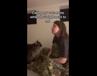 Woman pretending not to see cat 