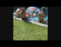 Girl sit circle floater guy jump pool