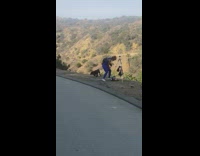 Woman blue sports outfit dance in front of a tripod