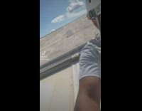 Men  jumps around on top of the stadium 