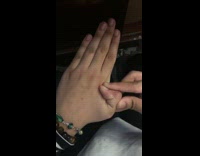 Woman move and bend her thumb