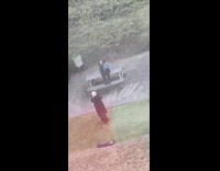 Girl blue shirt sit on wooden table