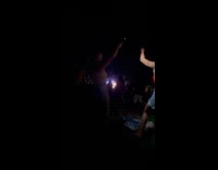 Woman sing and dances for concert video