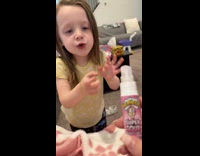 Girl demands to taste the sour spray 