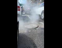 Manhole cover gets pushed up by steam