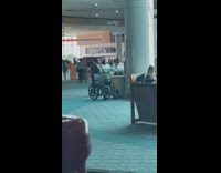 Three women tiktok dance at the airport