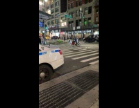 Kid throws garbage at man on street 