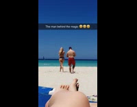 Woman bikini photo shoot beach by boyfriend