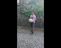 Guy throws giant mushroom in air and bops with his head