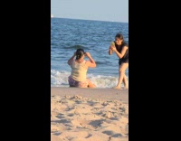 Collab IITW - Woman sit looks up pose at beach