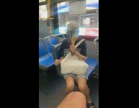 Lady uses magazine as face mask bus