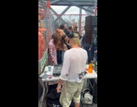 Crowd dances to the party at bridge