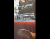 Googly eyes from mascot seen outside shop