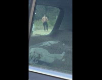 Collab Kook Of The Day - shirtless man plays with black stick