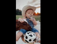 Baby photoshoot with cow and cake