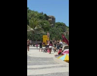 Woman in bikini Cheerleader lift on the beach park