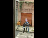 Woman in pink poses with her hair and hips