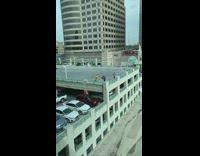 Man yellow rooftop parking video