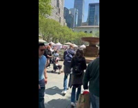 Man takes off shoes dances in fountain