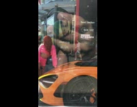 Girl pink crop top orange expensive car