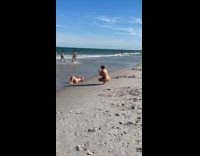 Woman pink bikini lie down at beach