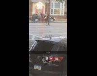 Girl records herself spinning middle of street 