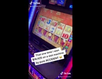 Guy wins jackpot on slot machine