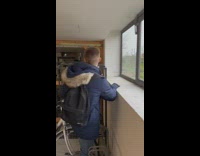 Man Catches Trapped Black Bird from Basement