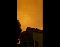 Sky turns orange brown from wildfires guy