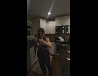 Woman puts her hand on a mouse trap 