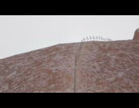 Guy zooms in brown white mountain top 