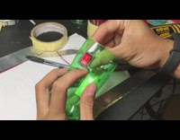 Guy makes taser using green plastic bottle 