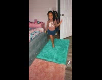 Siblings walking into a room to a song wearing matching outfits 
